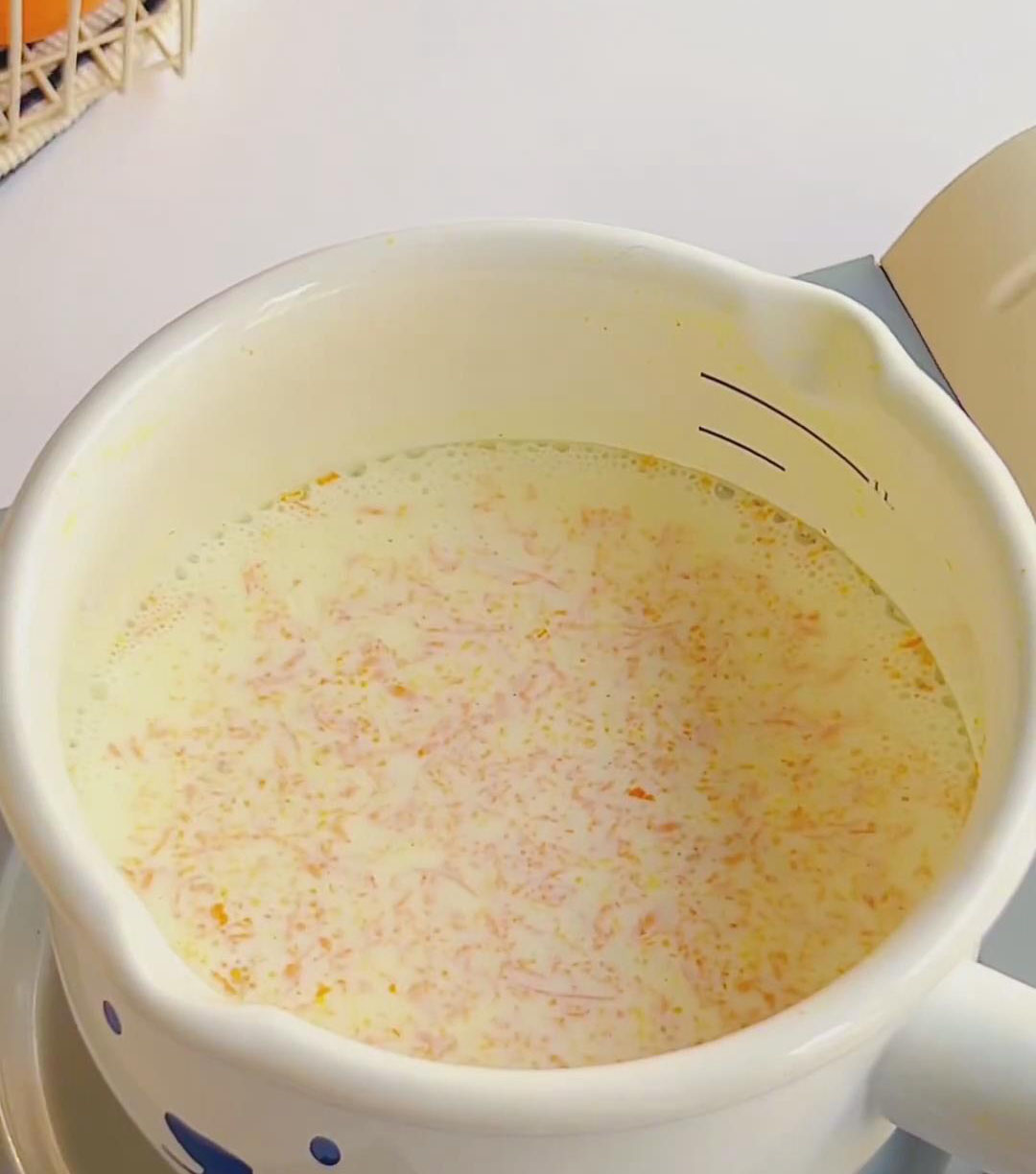 Heat gently over low heat until small bubbles appear around the edges