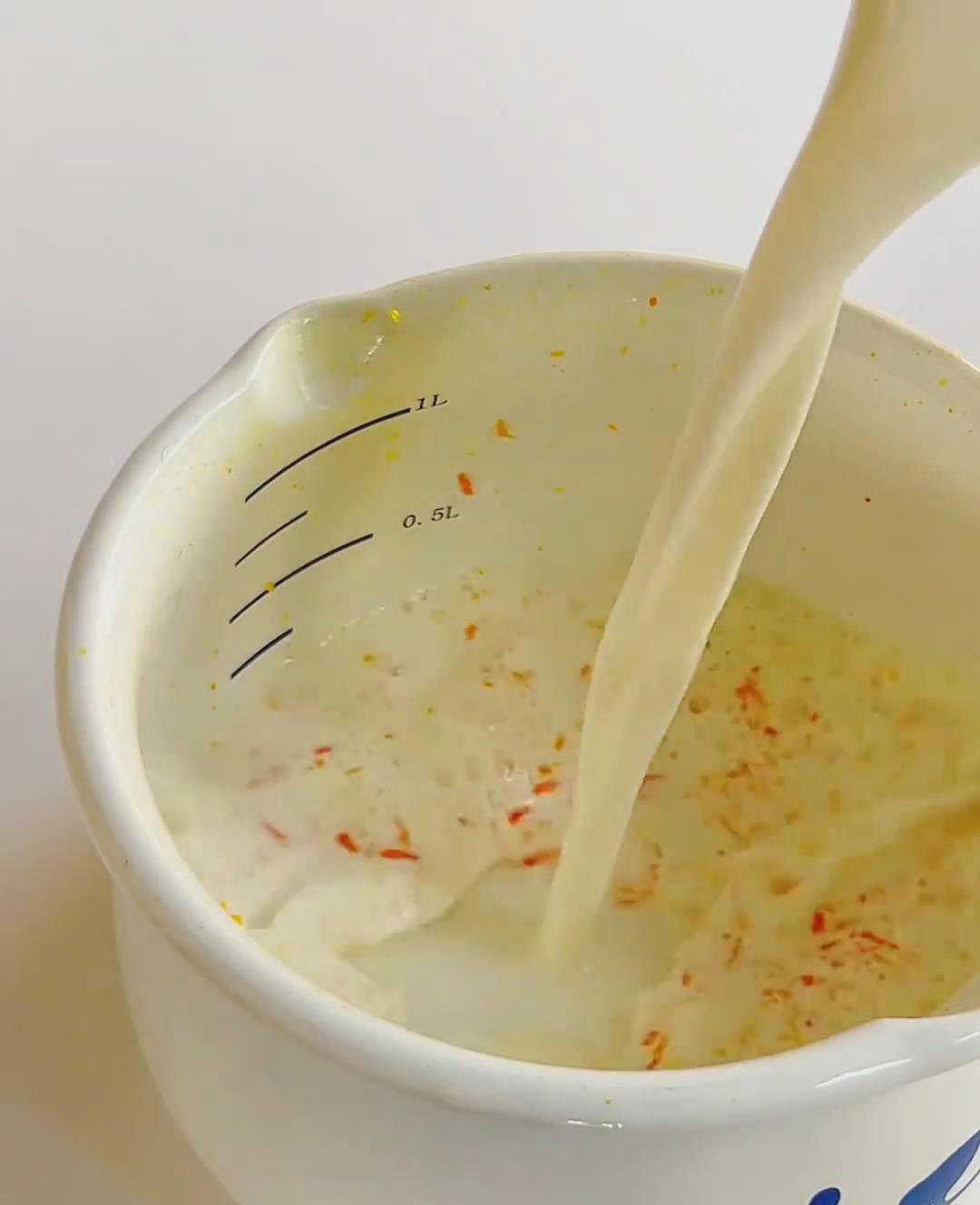 combine milk and orange zest