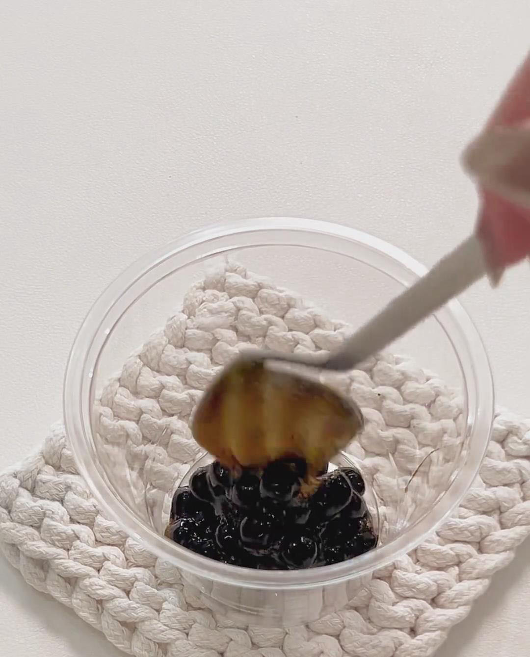 Add a layer of brown sugar boba to each dessert cup