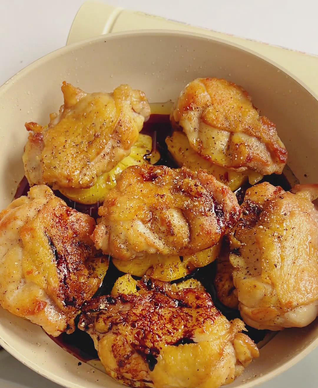 Add honey, light soy sauce, dark soy sauce, a pinch of sea salt, and the remaining black pepper to the pan