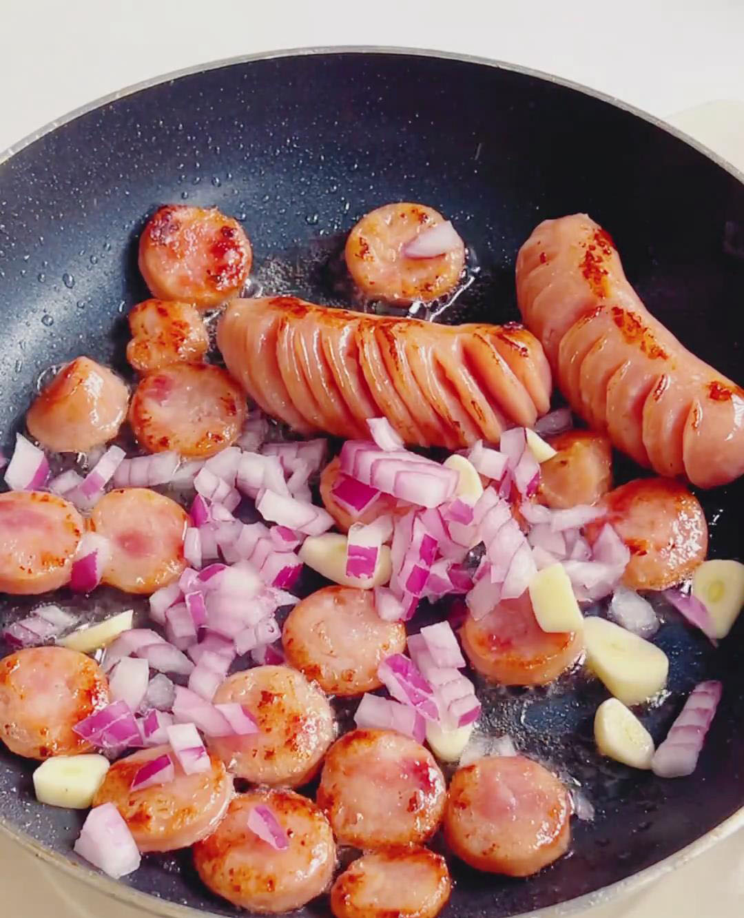 Add the chopped onion and garlic