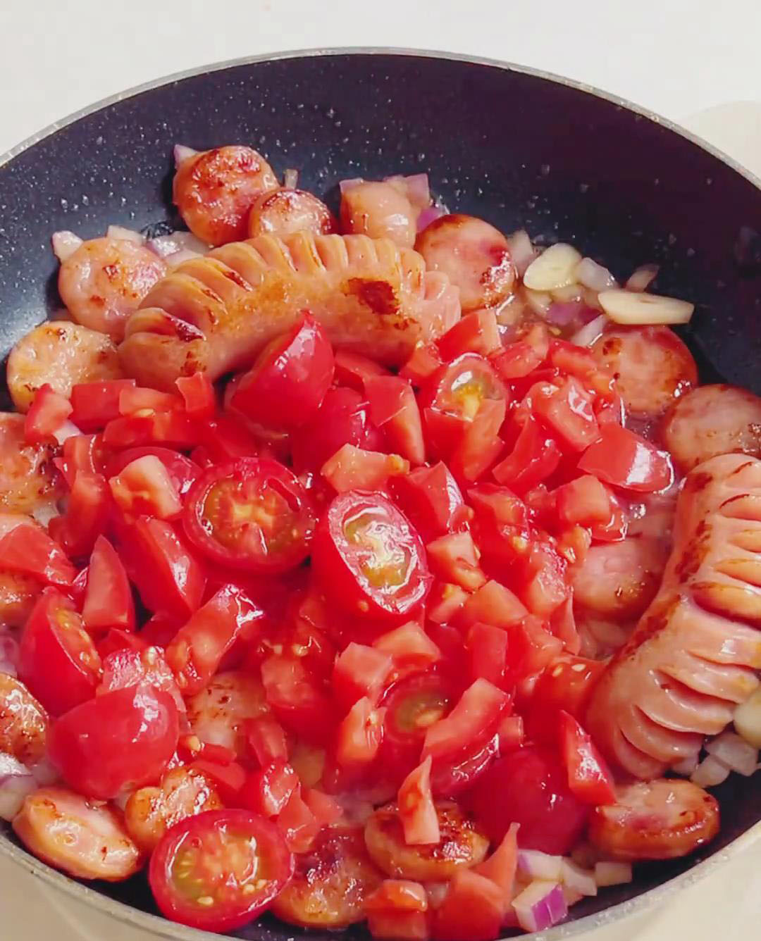 Add the tomato and cherry tomatoes