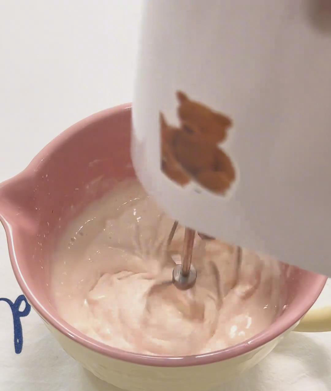 Beat softened cream cheese, sugar, and milk tea