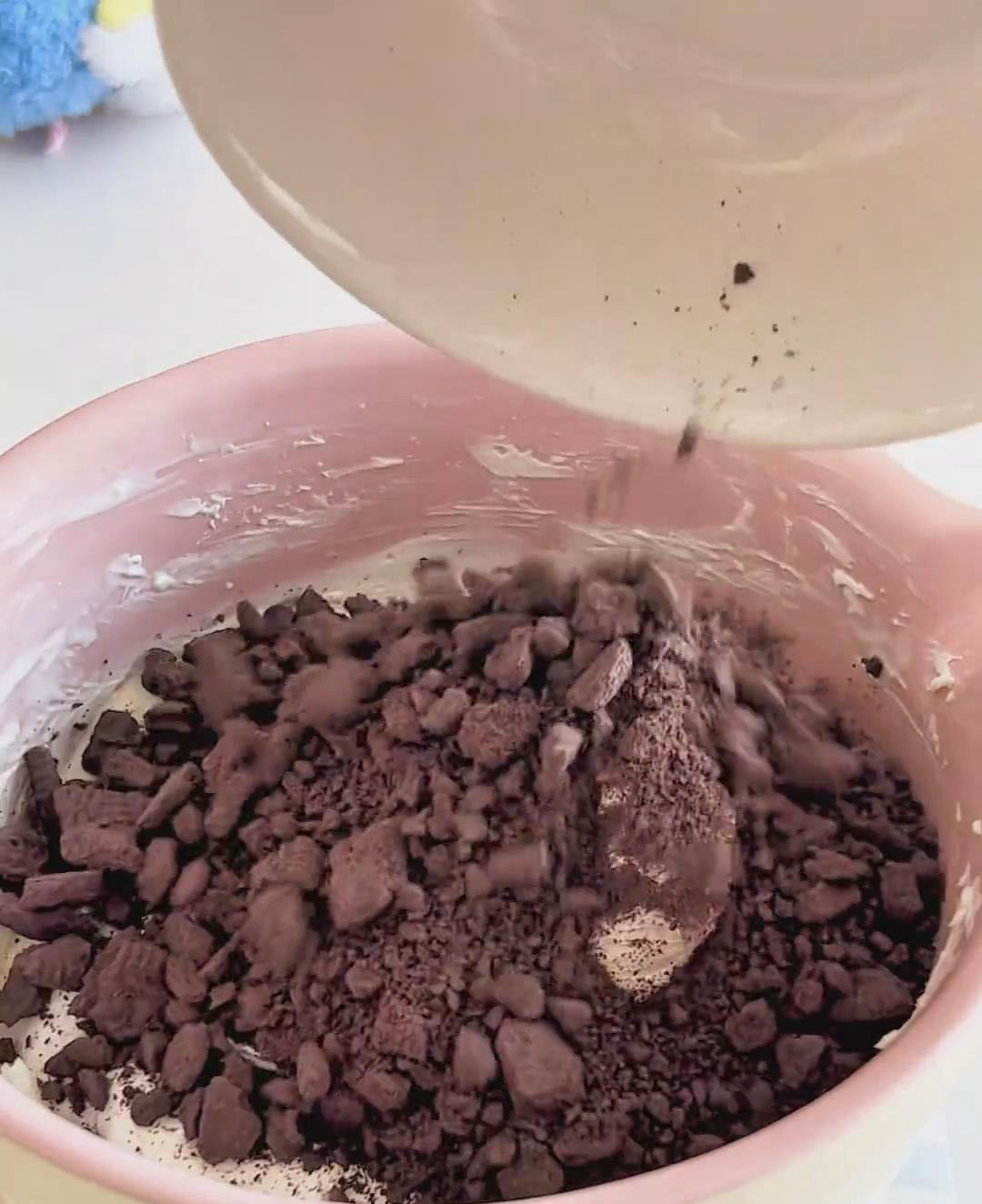 Fold in the Oreo crumbs