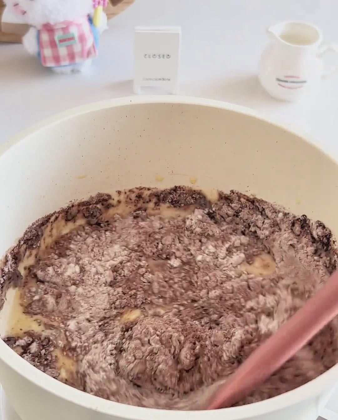 Immediately pour the dry mixture into the hot milk mixture