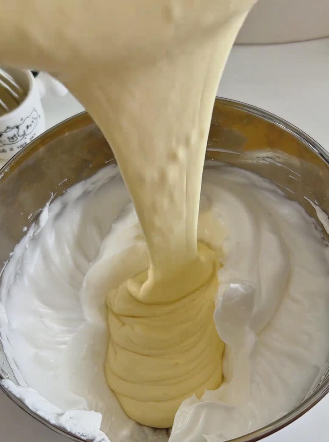 Pour back into remaining meringue