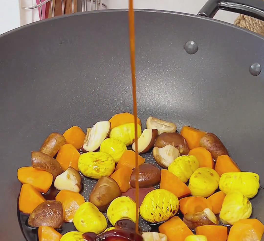 Pour in the 2 teaspoons of light soy sauce, dark soy sauce, salt, and a pinch of sugar