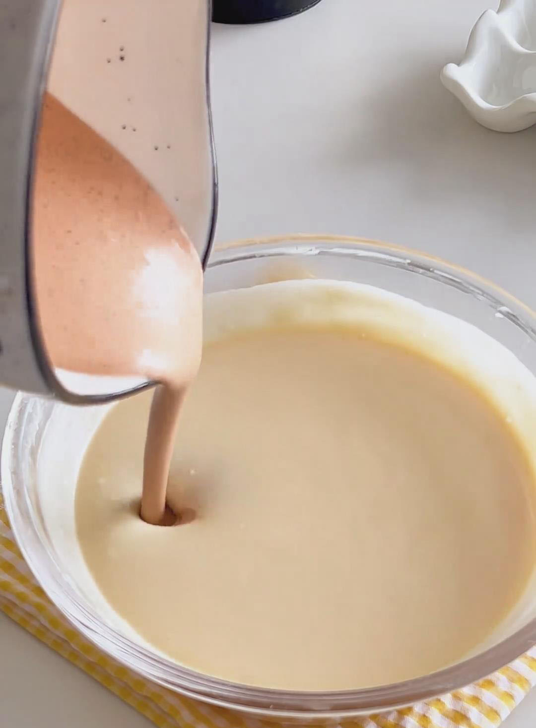 Pour in the completely cooled Thai tea cream