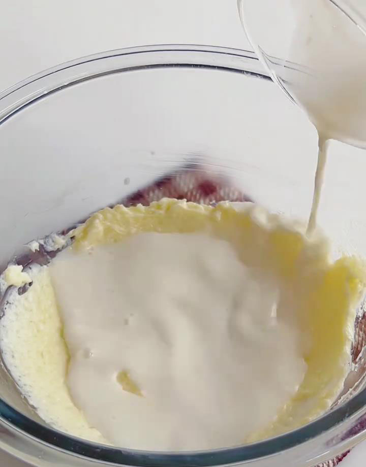 Pour the warm milk–gelatin mixture into the cream cheese