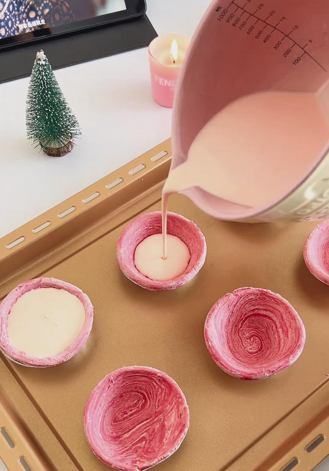 Slowly pour the strained custard into the shells
