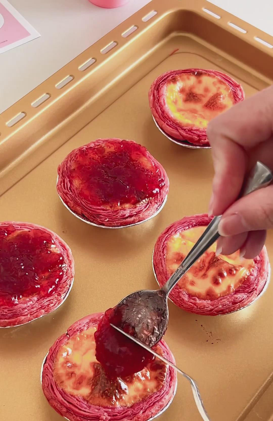 Spread a layer of strawberry jam