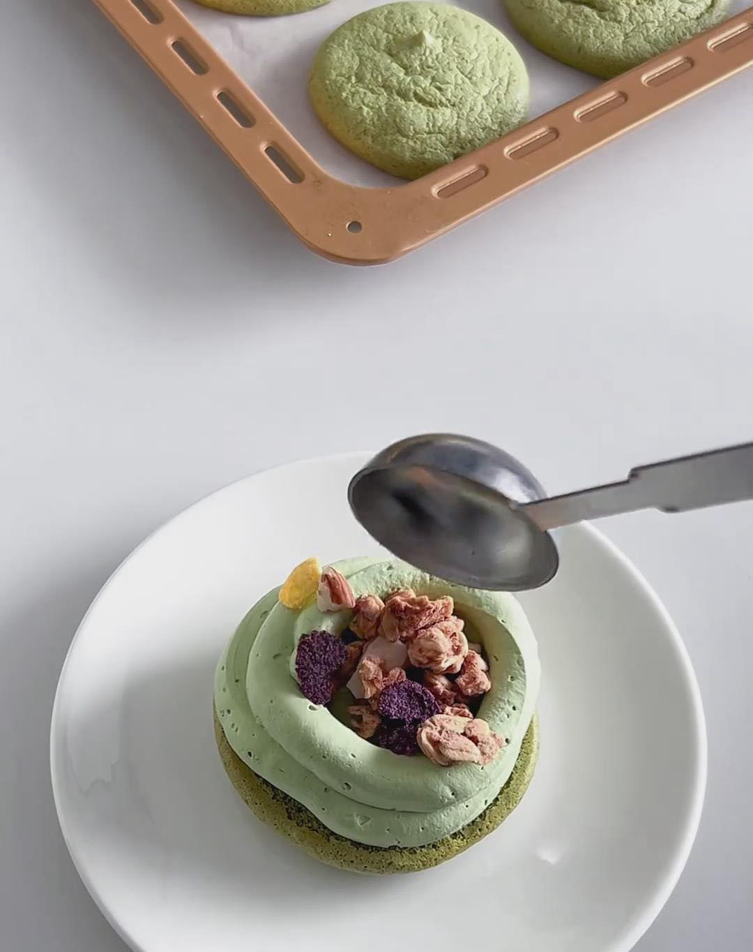 Sprinkle some oat clusters over the cream