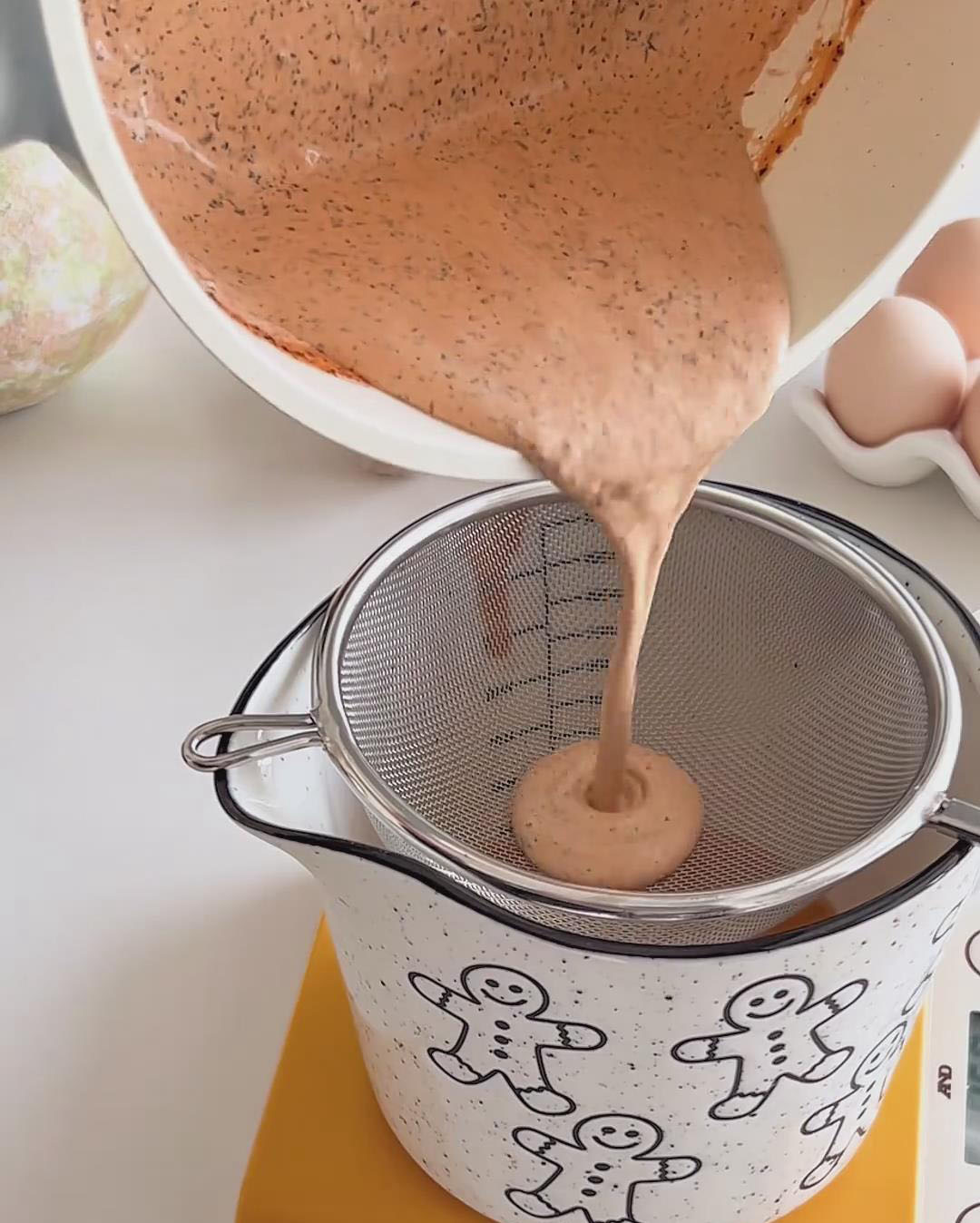 Strain the infused cream through a fine mesh sieve