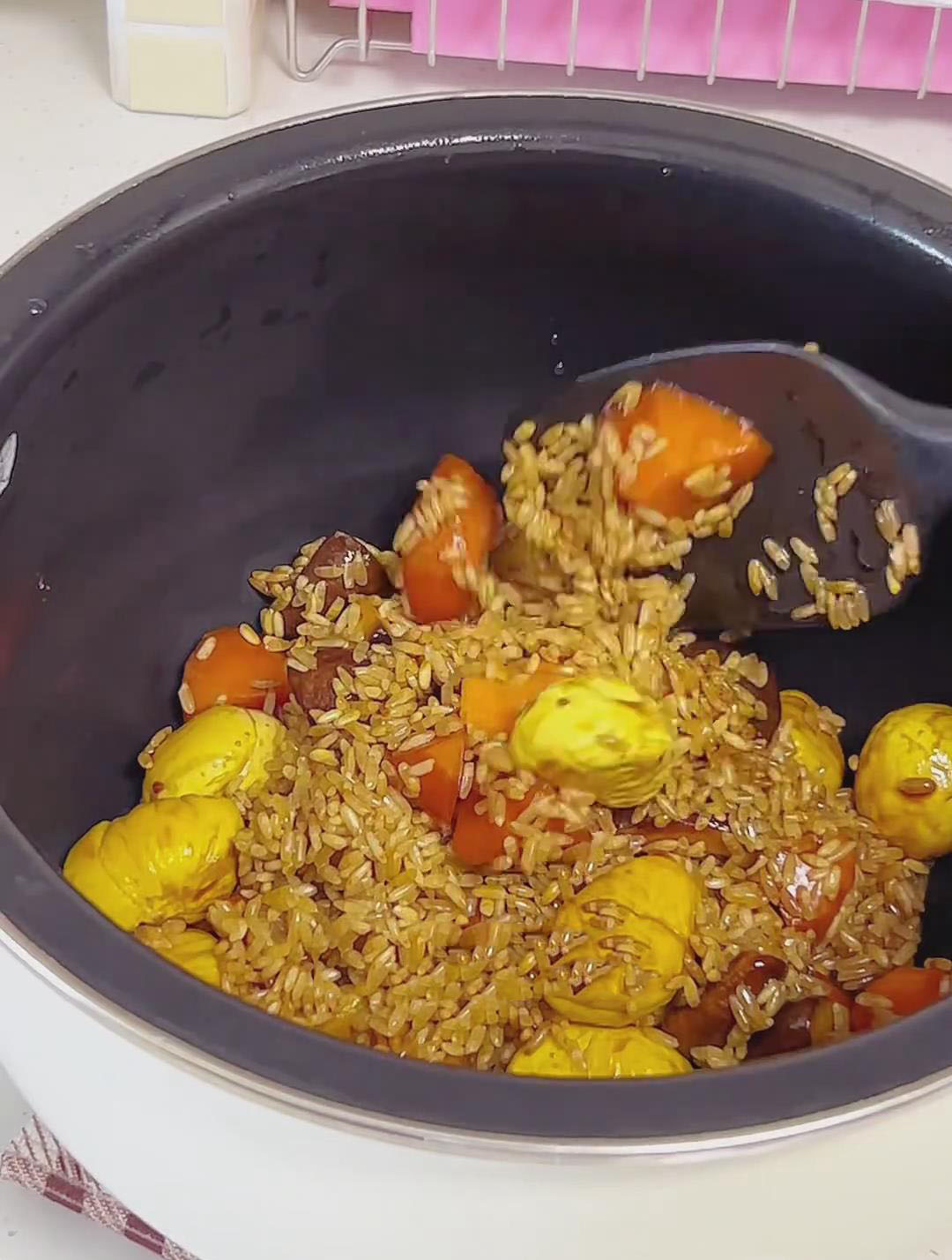 Transfer the entire contents of the skillet (the rice and vegetable mixture) into the inner pot of your rice cooker