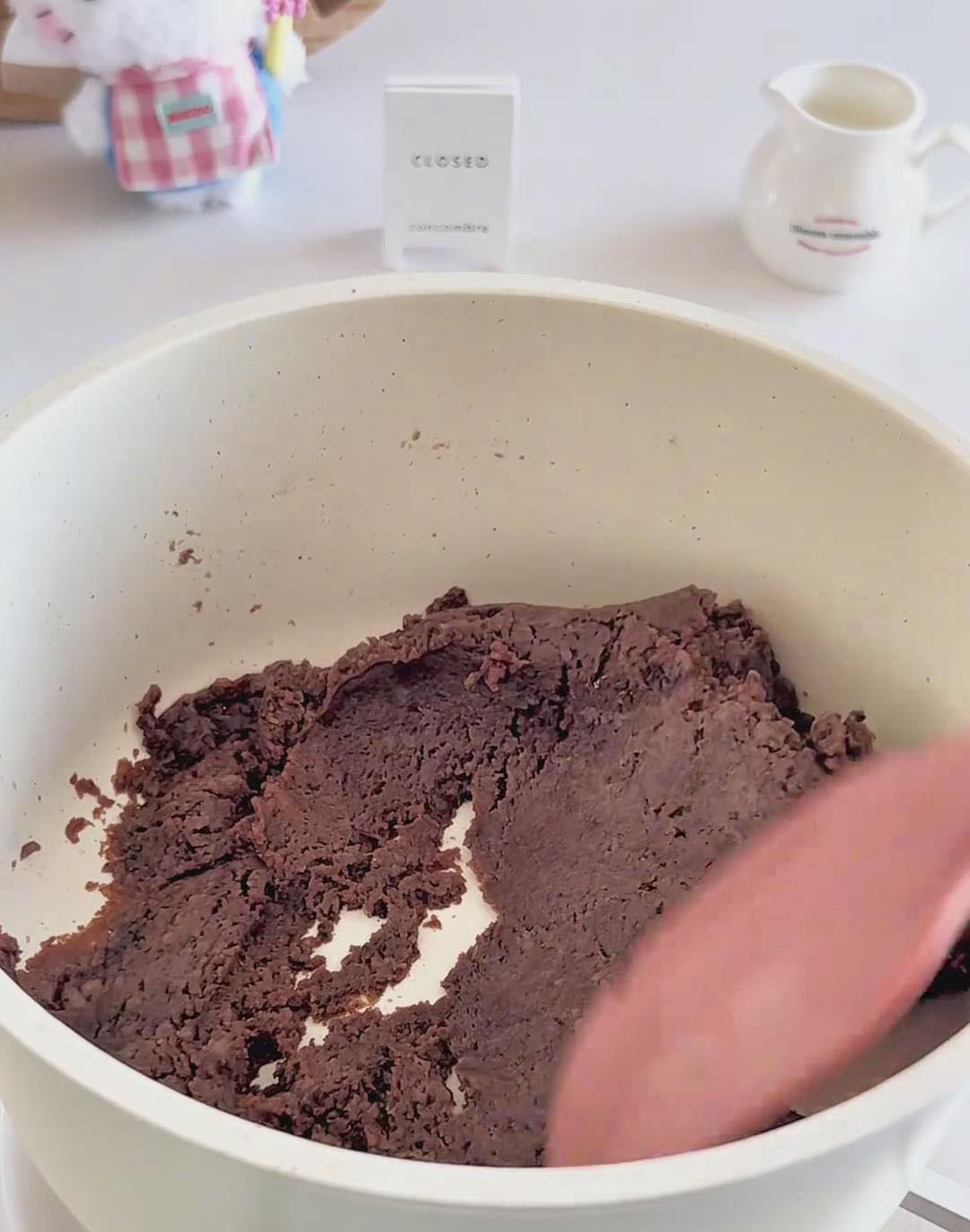 Use a spatula to mix quickly until a smooth dough forms