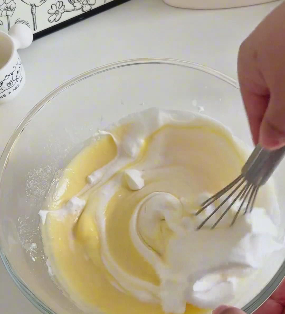 Use a whisk to roughly combine the two mixtures