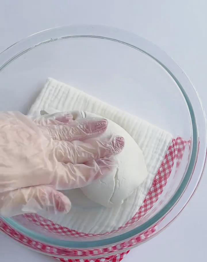 Use your hands to knead the mixture into a smooth, elastic dough