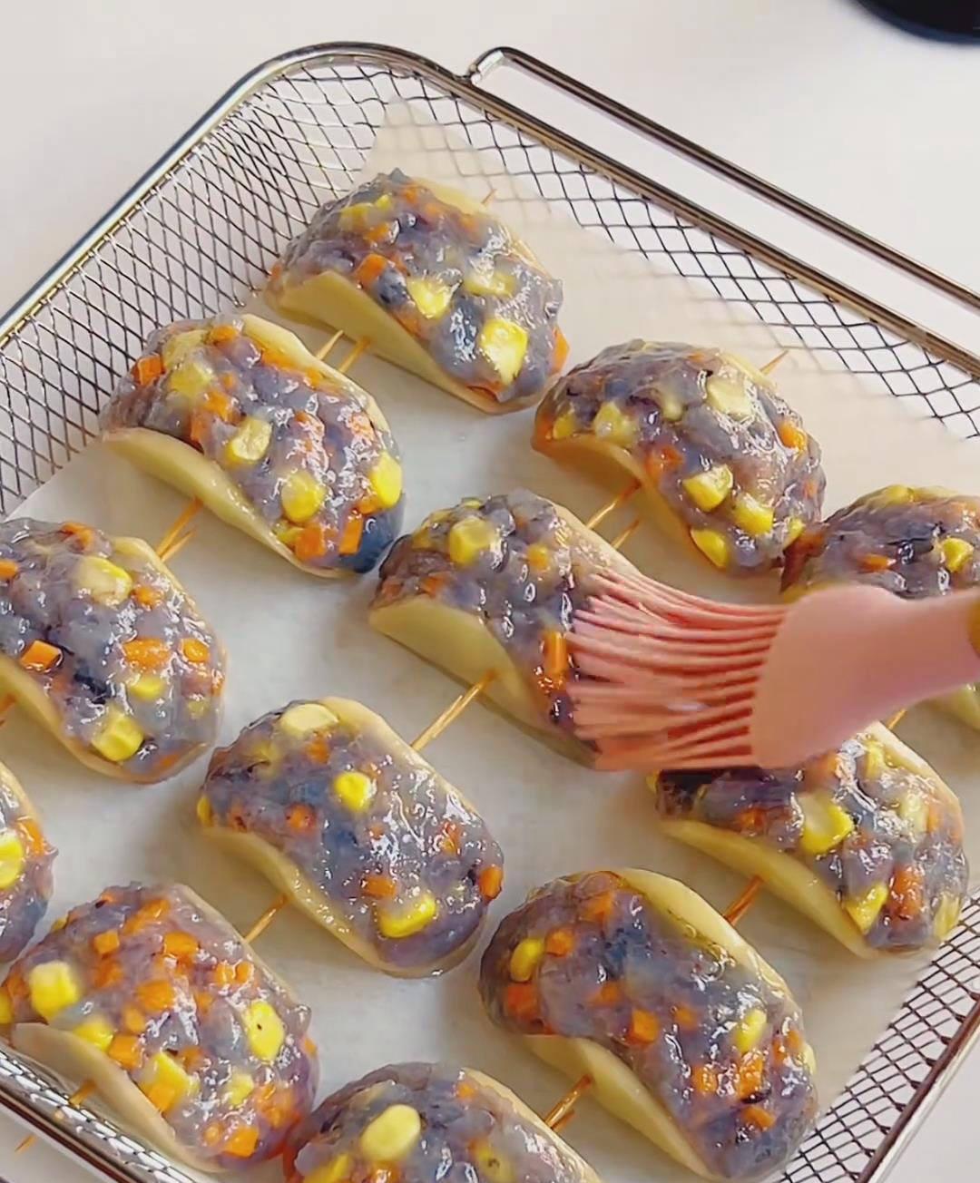 brush the outside of each roll