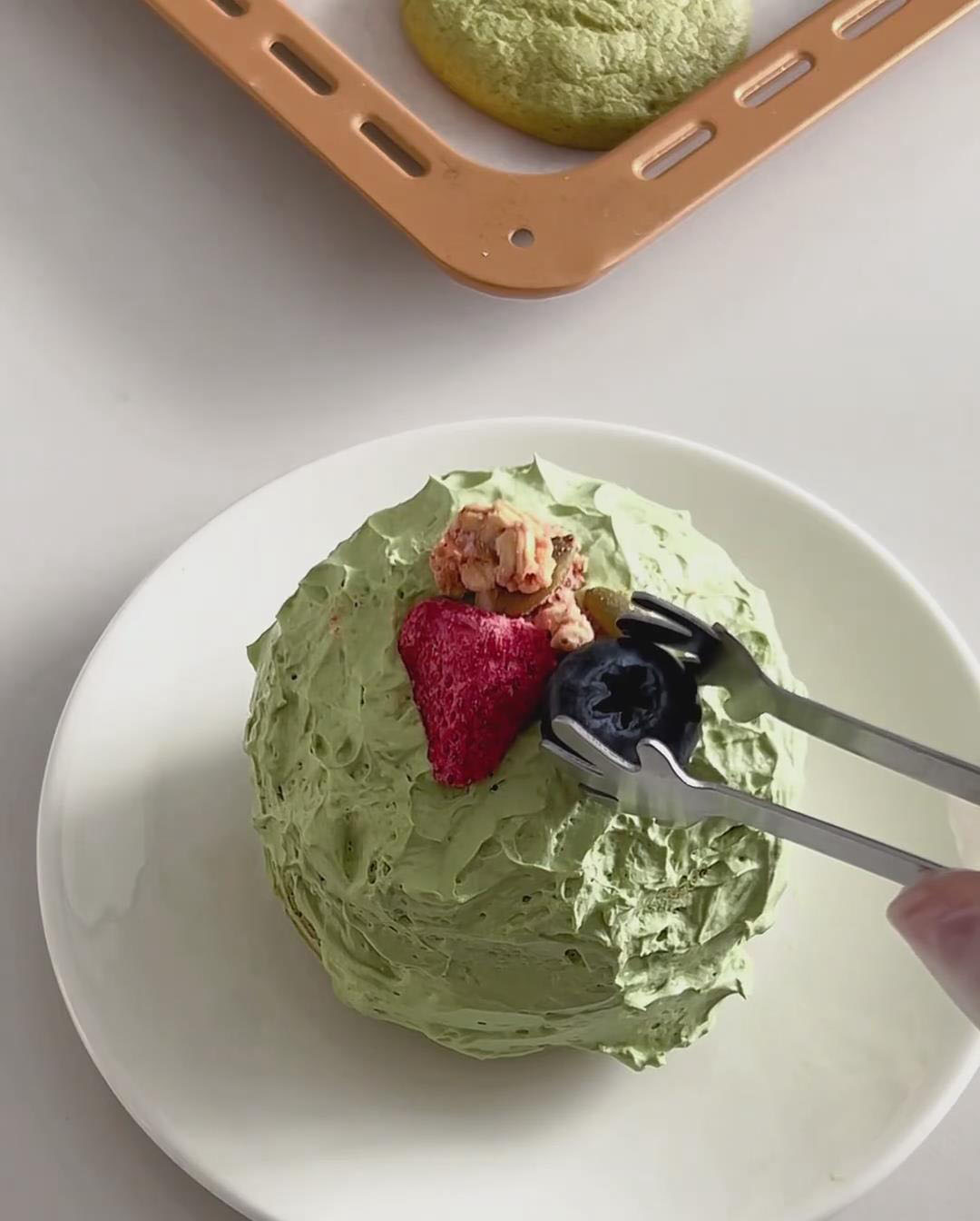 decorate with dried fruit and oat crumbs