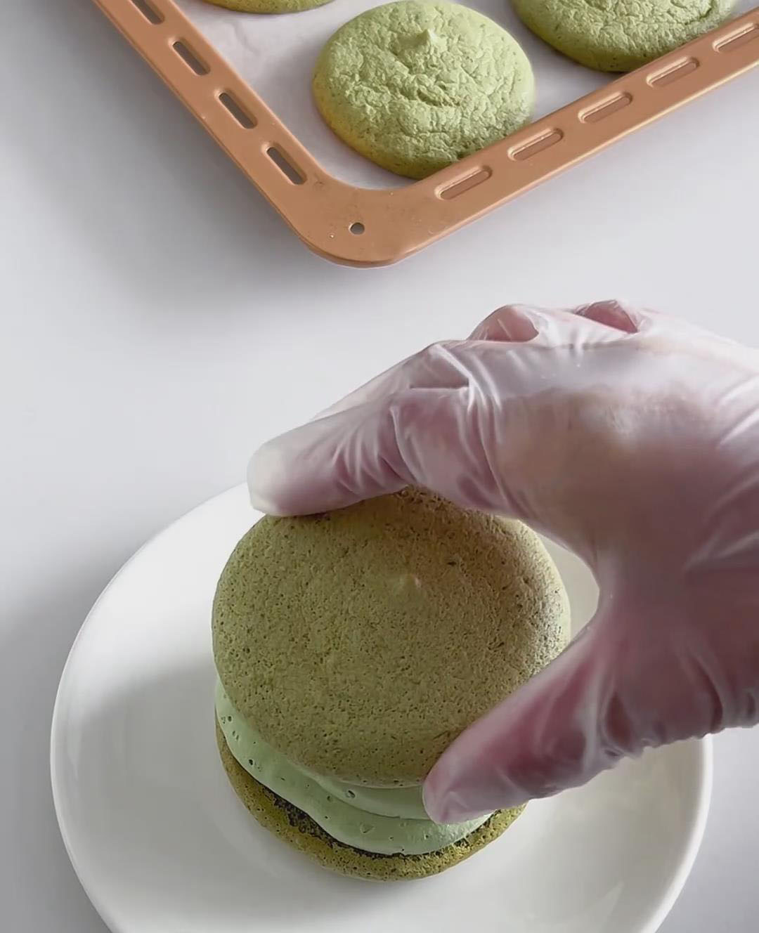 gently press a second cake round on top