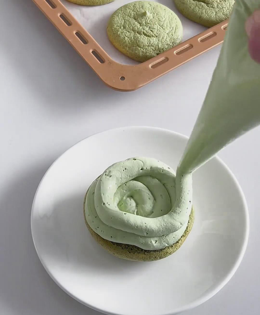 pipe a layer of matcha cream onto it