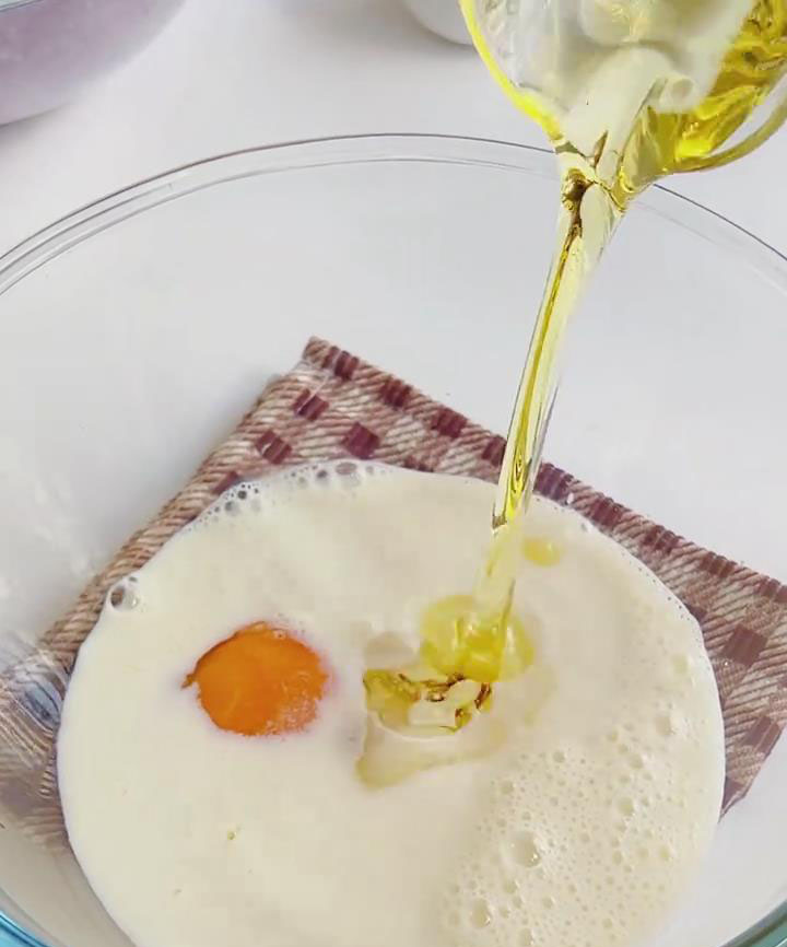 pour in the milk and corn oil