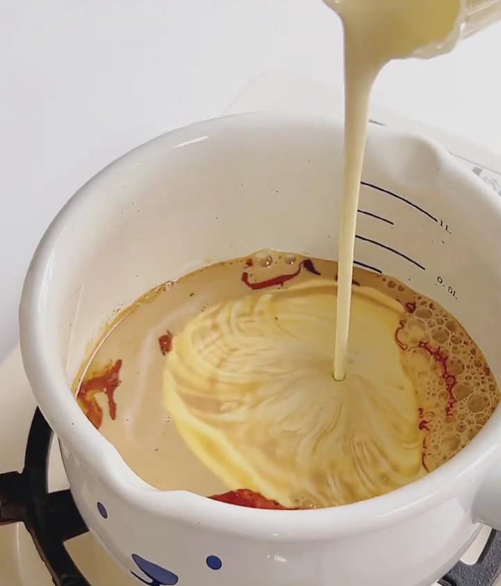 pour in the milk and heavy cream