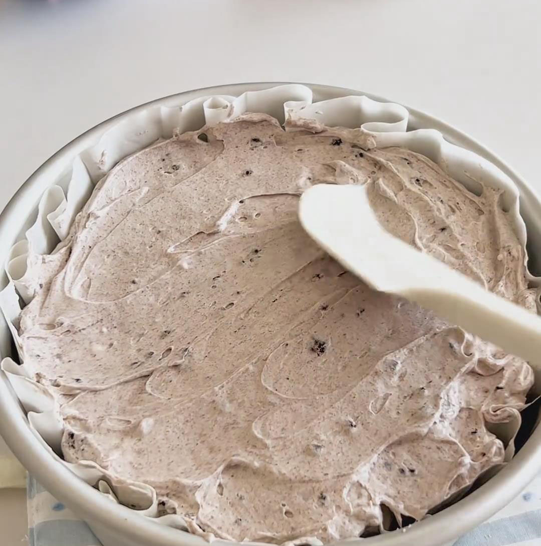 spreading it into a smooth, even layer