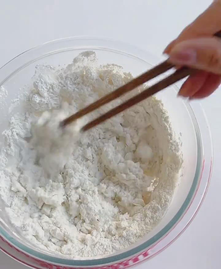 stirring quickly with chopsticks