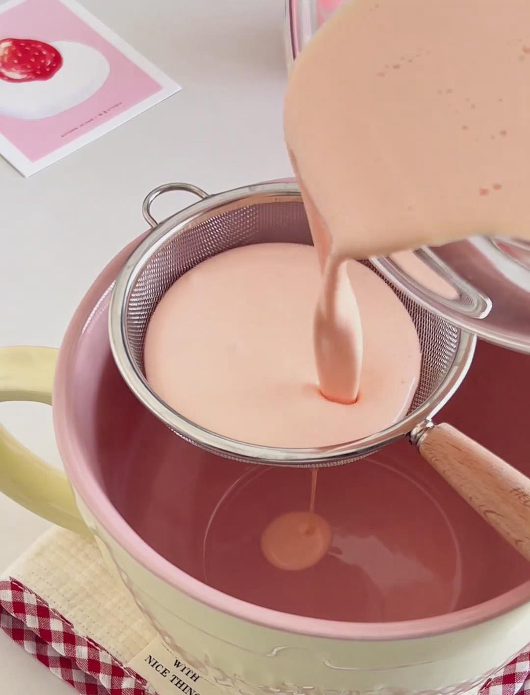 strain the entire custard mixture through a fine mesh sieve into a jug or another bowl