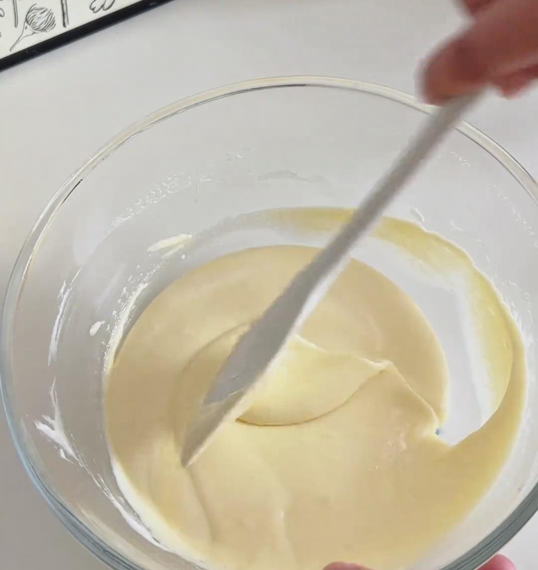 switch to a spatula and gently fold from the bottom until the batter is smooth and evenly mixed