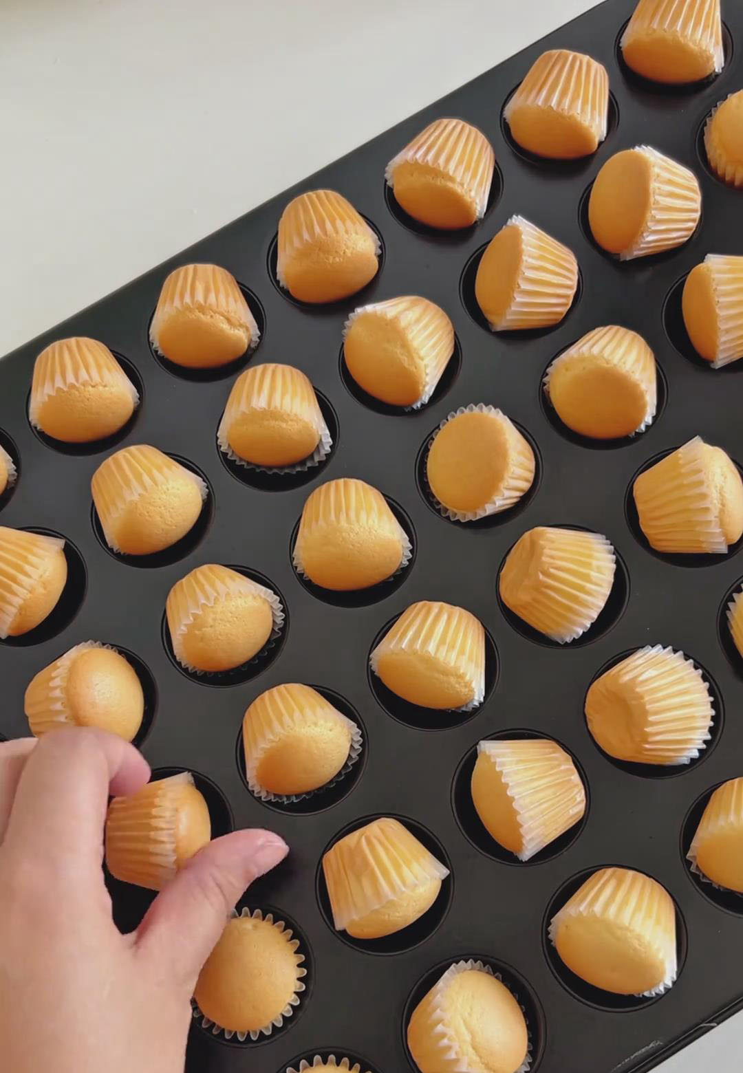 turn the cupcakes on their sides in the pan to cool