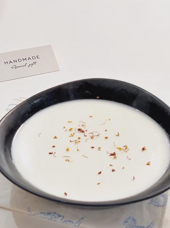 Garnish with a small pinch of fragrant dried osmanthus flowers