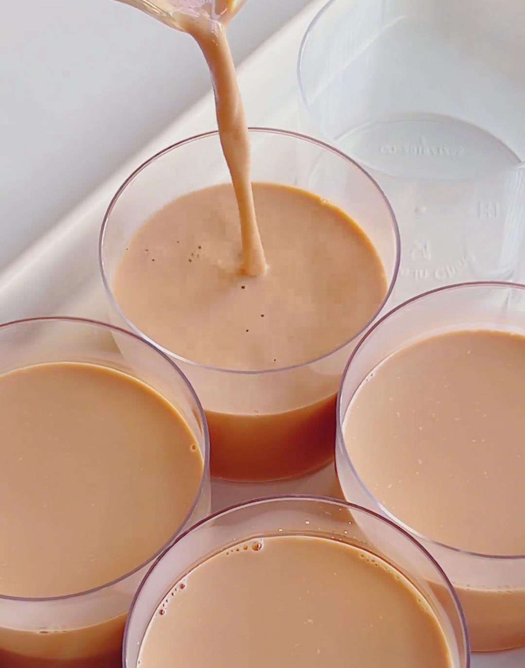Pour the Thai tea panna cotta mixture into cups or molds