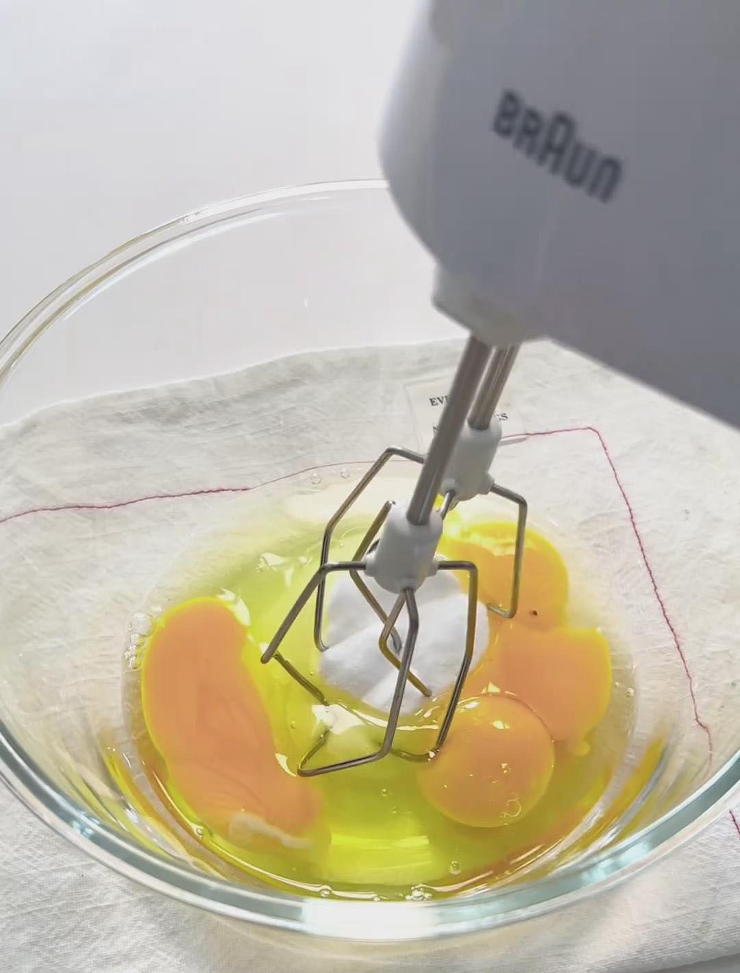 combine the room temperature egg and 35g of sugar