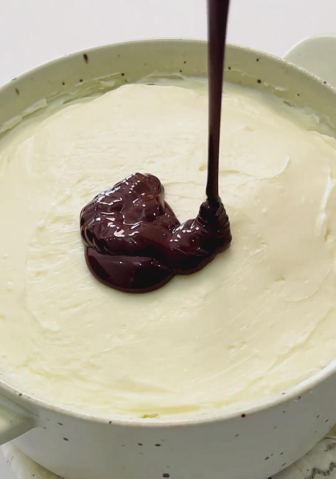 melted chocolate over the cream cheese layer