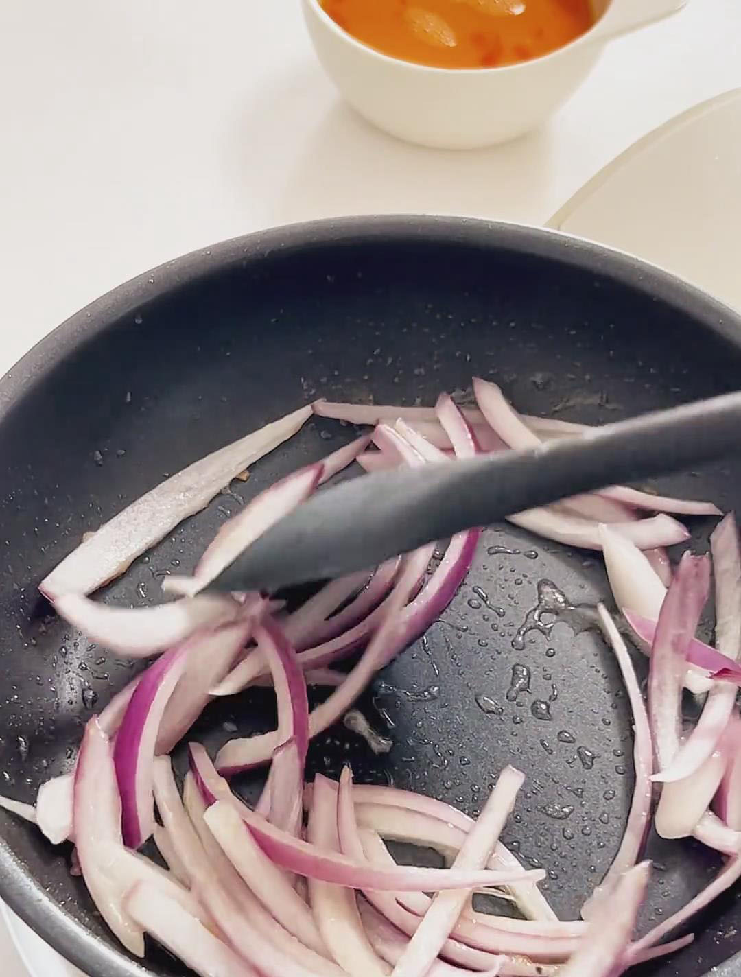 sauté the sliced onions until fragrant