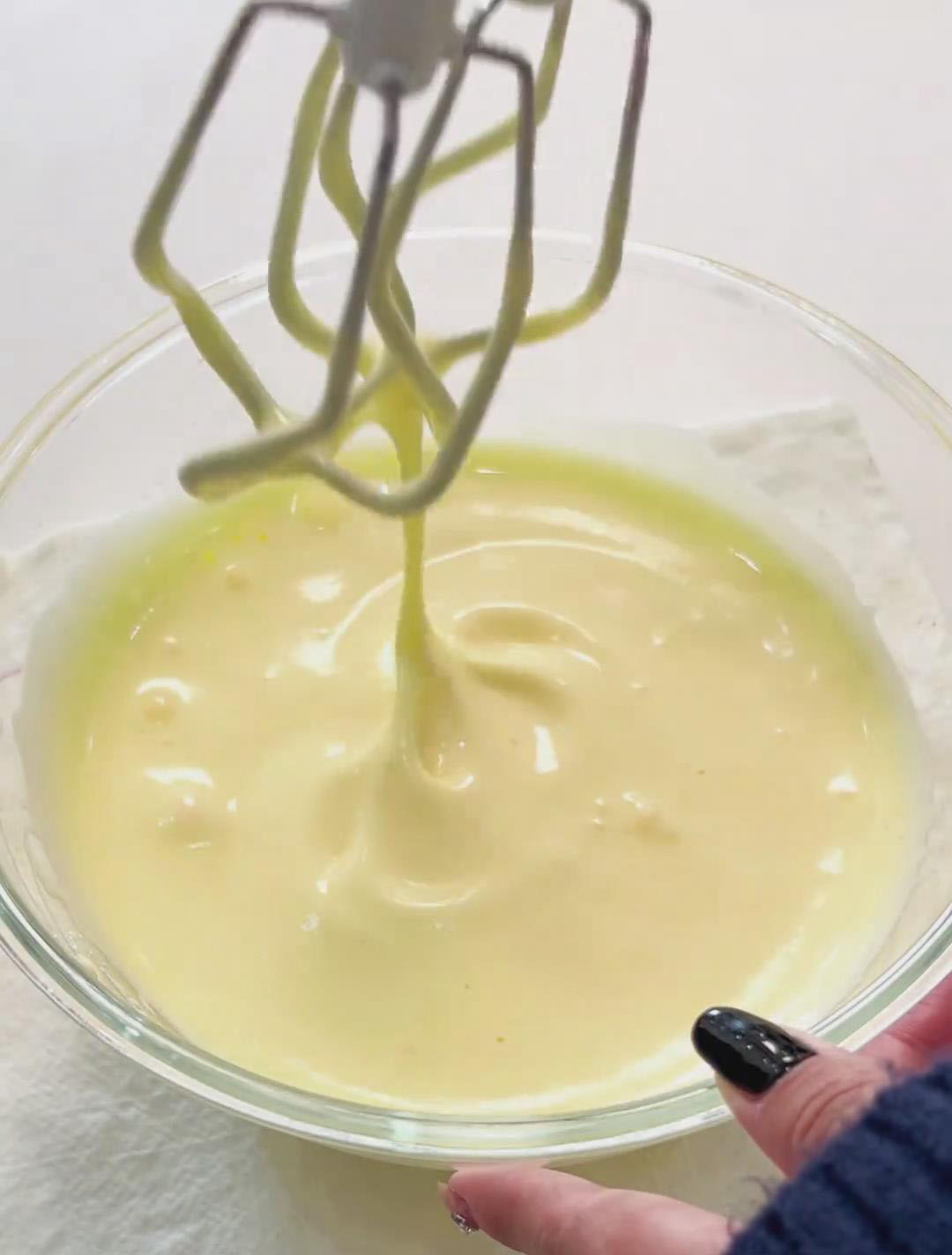 until the mixture becomes pale yellow